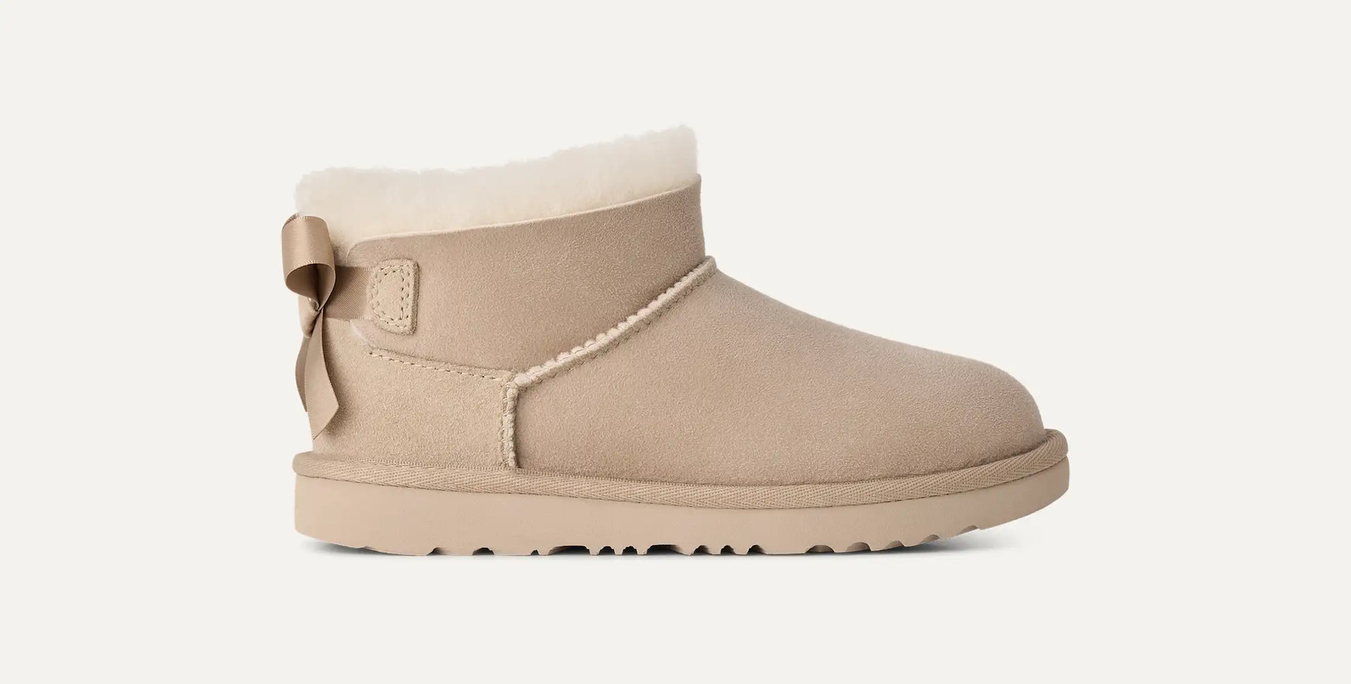 UGG Ultra Mini Bailey Bow Boot for Kids Sand