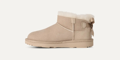 UGG Ultra Mini Bailey Bow Boot for Kids Sand